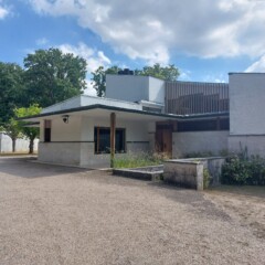 Hiša Louis Carré - glavni vhod pri nadstrešku.